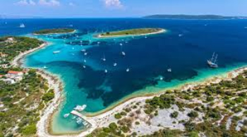 sailing-destination-03 image Blue lagoon with small port and few houses-Dalmatian islands